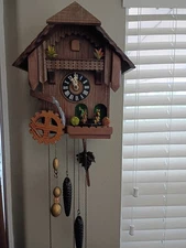 VINTAGE RARE MUSICAL CHALET HUNTER CAROUSEL, WATER WHEEL CUCKOO CLOCK..WORKING,,