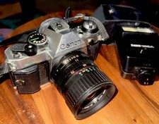 Canon AE-1 SLR Film Camera - Black With Canon Speedlite 188A Flash 35mm-70 Lens