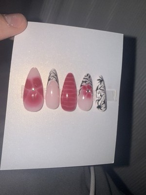 Long Almond Press-On Nails Set with zebra print and blooming flower.
