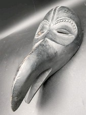 Antigua máscara africana Dan Bird Spirit cuervo negro pico largo tallado madera como está