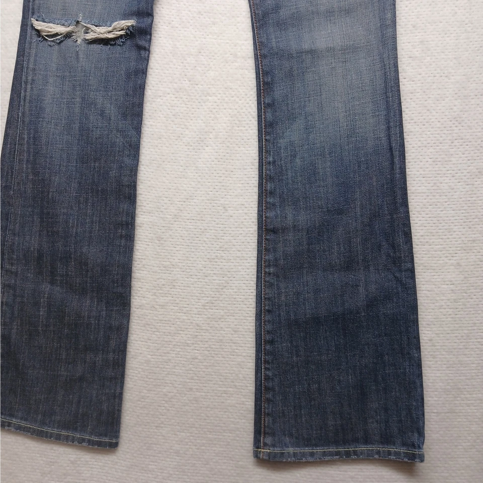 Pantalones de mezclilla para mujer People's Liberation Tanya Bootcut tiro bajo lavado medio Foto 4 de 4