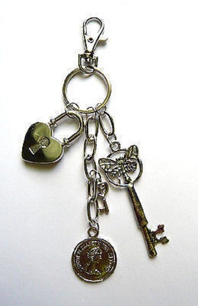 LLAVERO O COLGADOR PARA BOLSO O LLAVES DE ACERO INOXIDABLE ORIGINAL DISEÑO