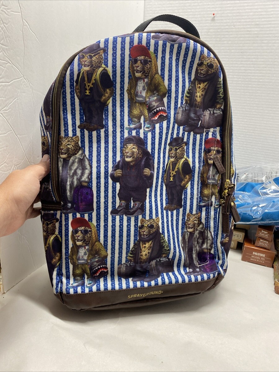 バッグ Spray ground SESAME STREET COOKIE MONSTER SNACK ATTACK DLXSV BACKPACK