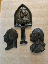 Antique/Vintage Cast Iron George Washington Trivet and two wall hangings.