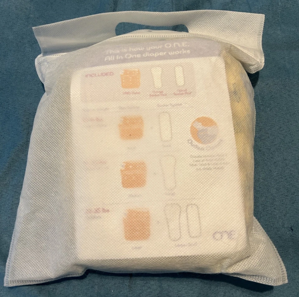 Pañal de tela reutilizable GroVia ONE cierre a presión nuevo en paquete Kickstarter diente de león Foto 2 de 2