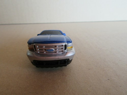 755J Maisto Hoodz 1999 Ford Super Duty Azul 1:64 - Imagen 4 de 7