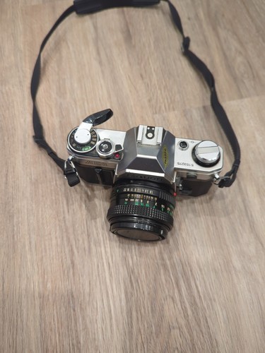 Canon AE-1 Program 35mm Manual SLR Film Camera with 50mm 1:1.8 Lens - Works - Picture 1 of 4