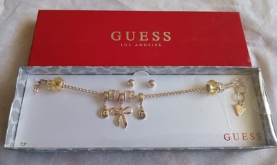 GUESS GOLD TONE CHARM BRACELET 