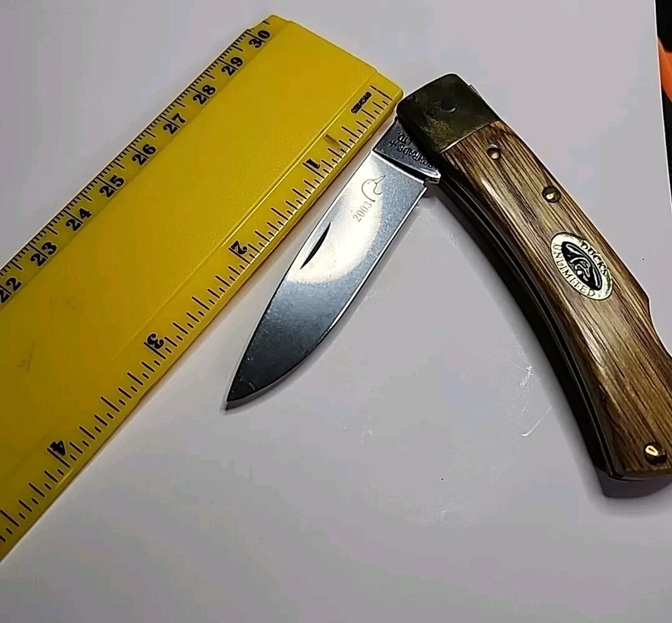 CUCHILLO SCHRADE EE. UU. PATOS ILIMITADO LATÓN REFUERZO LB MADERA BRUIN Edición Limitada Foto 3 de 4