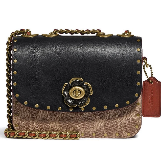 Madison shoulder bag 16 in signature canvas with rivets sales