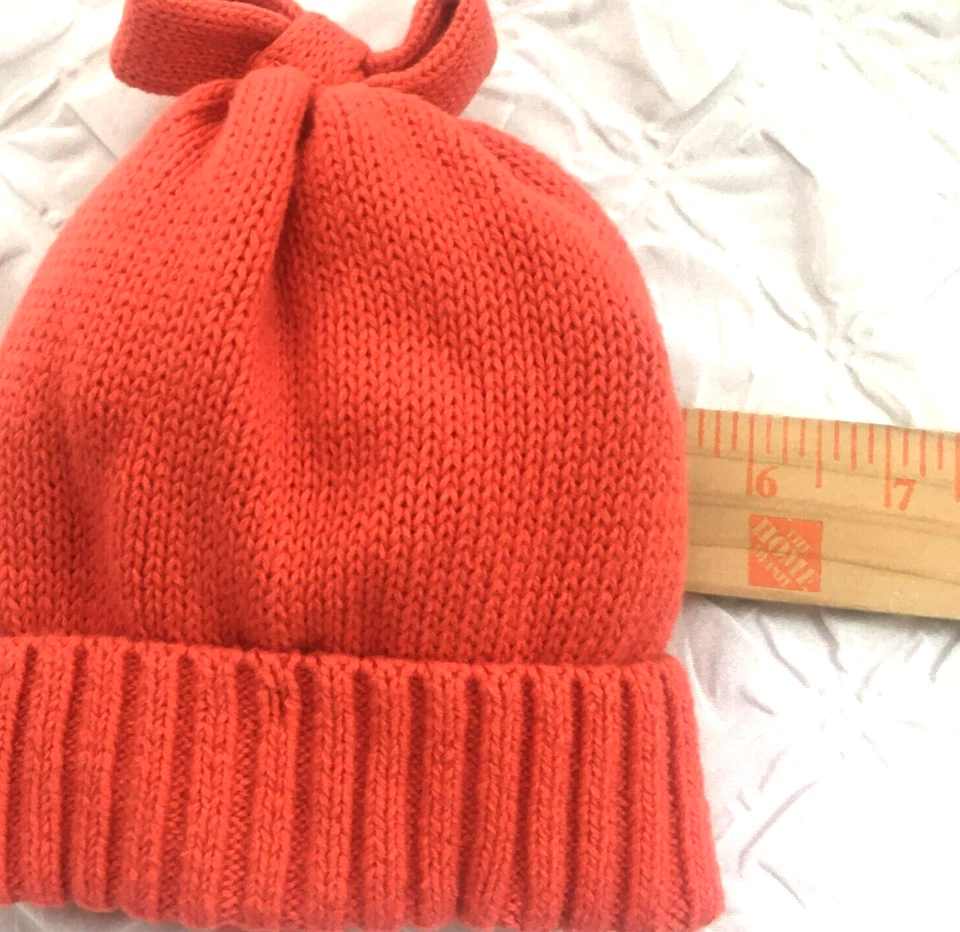 Gorro tejido de algodón naranja con moño Baby Gap para niñas talla 0-6 meses Foto 4 de 4