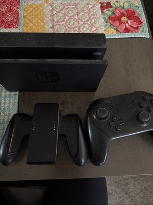 Nintendo Switch with tv hookup,case and pro controller.  