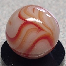 West Virginia Swirl marble-.59" Mint-, red/orange swirls, mossy Transl. base-