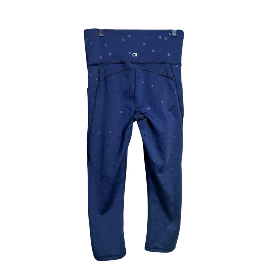 Leggings para mujer GapFit estrellas azules apagón tecnología bolsillos recortados tiro alto talla XS Foto 2 de 4