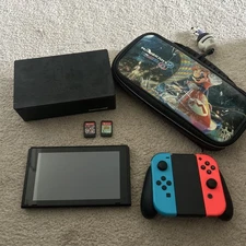Nintendo Switch Red and Blue Joy-Con Console. W/ Games, dock, and MORE! 
