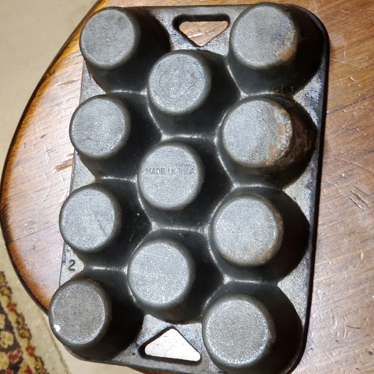 Sold at Auction: Cast Iron Muffin Pan