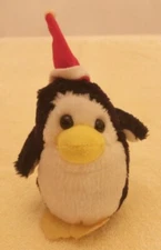 Vintage 1980s Dan Brechner Penguin with Red Santa Hat Stuff Animal Plush