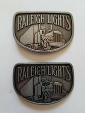 Vintage Raleigh Lights Belt Buckle Lot of 2 - Semi Truck New Old Stock