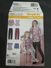 Simplicity 1334 Pattern Girls' Top, Mini Skirt & Slim Pants Sizes 7-14 Cut