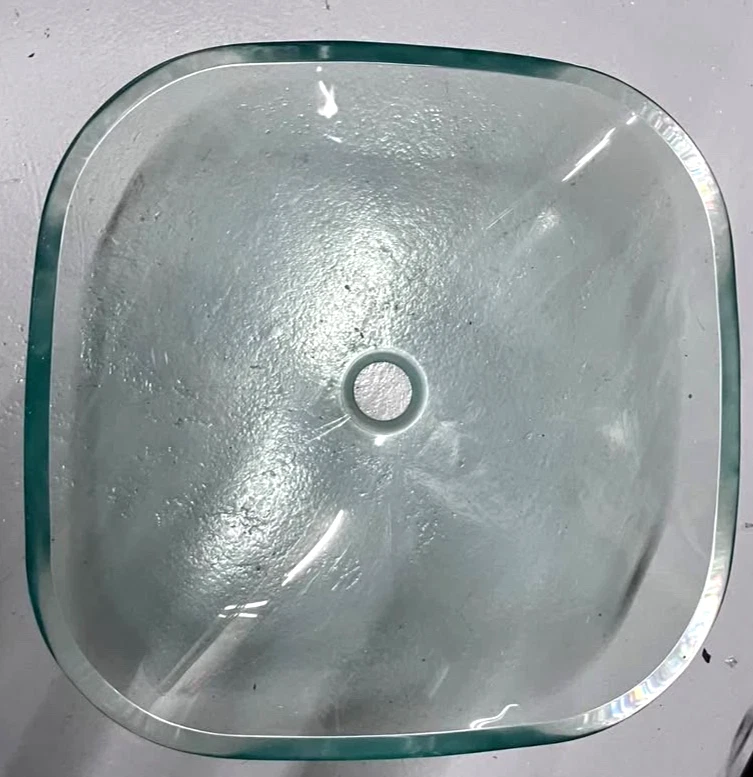 Juego de grifos emergentes para lavabo de vidrio templado con encimera ovalada Foto 2 de 4