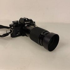 Nikon EM 35mm Film Camera And Accessories Pictured