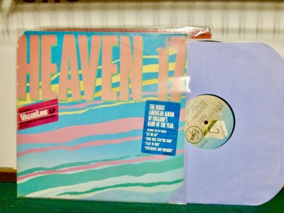 HEAVEN  17   SYNTH POP  DEBUT. '' LET ME GO''.   NEAR MINT   LP