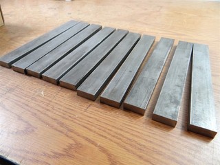 10 PIECES OF 4140 STEEL STOCK 1/2" X 1 1/4" X 10" 17LBS (STOCK #297)