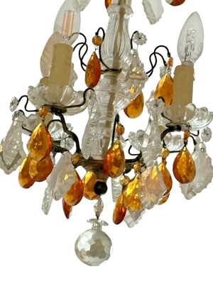 Lustre à pampille du XVIIIème siècle, cristal blanc et ambré, bronze et fer forgé doré