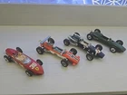 Corgi Toys Ferrari, Maserati, Lotus, and another Lotus.