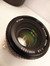 Nikon Ais Nikkor 50mm f 1.8 ottica trasparente. tappo anteriore completamente testato e