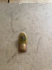 Antique 1930s Poll Parrot Shoe Advertising clicker.