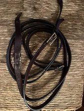 Unbranded brown leather reins with buckle ends