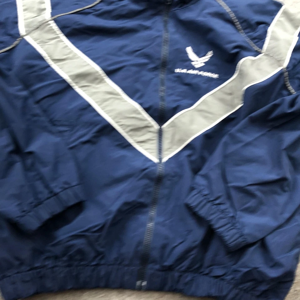 Chaqueta cortavientos reflectante PTU Skilcraft de nailon azul pequeña de la Fuerza Aérea de los Estados Unidos para hombre Foto 2 de 4