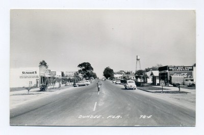 Dundee FL, street view, Hunt's Sundries, Balls Dept Store, truck, RPPC postcard