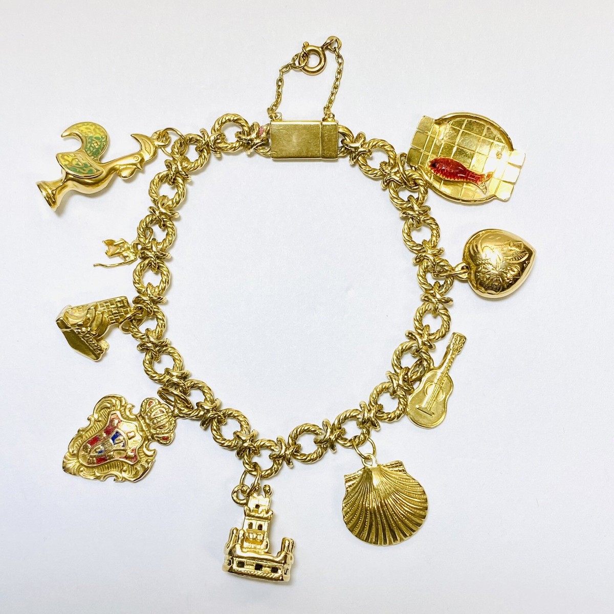 18金 10 Assorted Charm Bracelet 18K Yellow Gold (Stamped 80%) 9 Portugal Symbol Charms 7.25