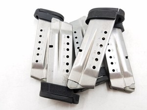 One Smith and Wesson S&W Shield 8rd 9mm magazine w/ Grip Spacer (Silver)