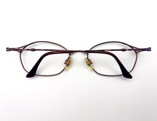 Monturas de gafas vintage años 90/Y2K Yves Saint Laurent | Metal marrón ovalado | Francia Foto 2 de 4