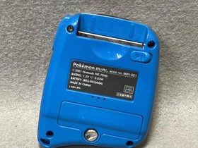 Nintendo Pokemon Mini console, soft cover, and 3 software sets