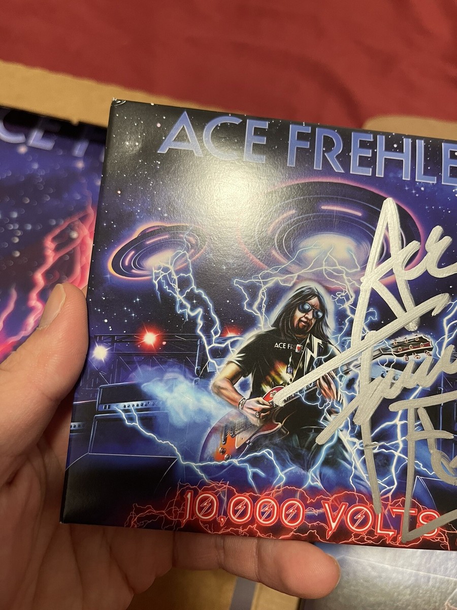 ACE FREHLEY SIGNED 10,000 VOLTS VINYL AND CD RED BLUE AND