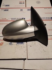 Espejo retrovisor de puerta manual pasajero derecho Chevrolet Aveo sedán 07-11 PLATEADO OEM