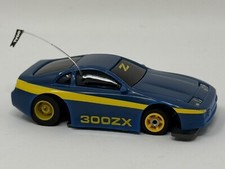 TYCO Nissan 300 ZX, Blue / Yellow Tyco Slotless Chassis NEW OLD STOCK WORKS 