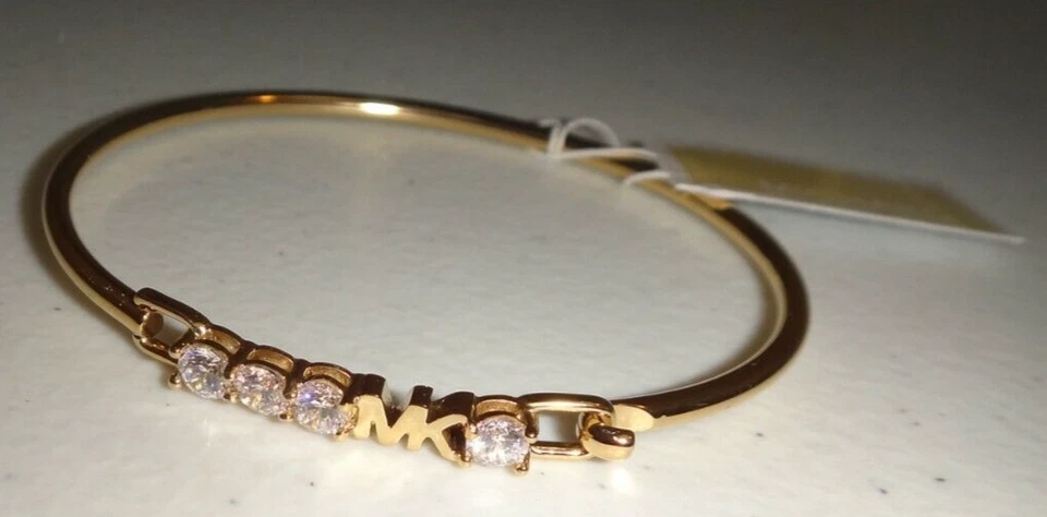 Brazalete Michael Kors MK Logo Oro Amarillo S/ Acero 4 Cristales Individuales MKJ7316710 Foto 2 de 4