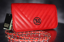 Studio Badgley Mischka red quilted vegan leather camera bag featuring a silver m