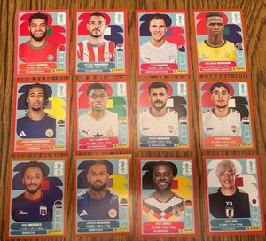 lot of 12 panini orange pink parallel stickers fifa World Cup 2026