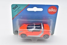SIKU 1065 Smart Roadster neon rot und silber. Metall. OVP Blister Karte