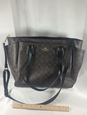 Bolso bandolera Coach con monograma para bebé