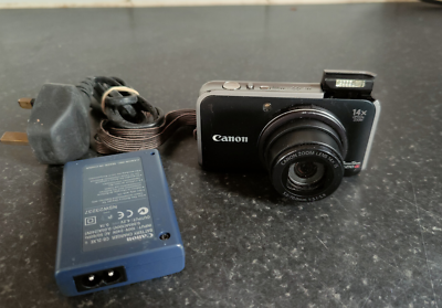 Canon PowerShot SX210 IS 14.1MP Digital Camera + charger