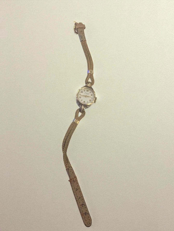 Reloj suizo AVIA 15 joyas para dama - Bisel dorado laminado 20 μ - Funciona C.1955 Foto 2 de 4