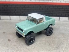 1965 IH Scout Lifted 4x4 Pickup Truck 1/64 Diecast Custom Off-Road Greenlight
