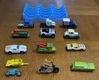 Lot of 12 Vintage Matchbox Cars, Trucks & Motorcycles In Blue Plastic Car Holder